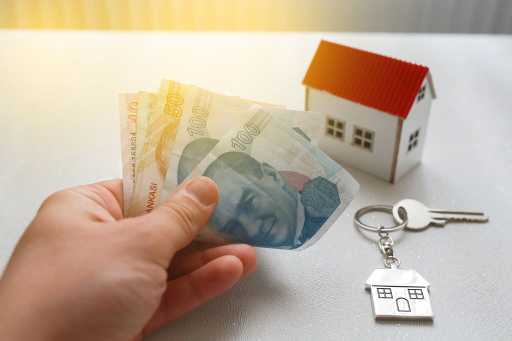 The increase in real estate sales in Turkey. turkish lira and small house